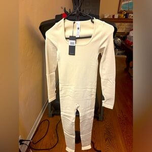 New Mooslover Solid Color Ribbed Long Sleeve Seamless Jumpsuit Apricot Small